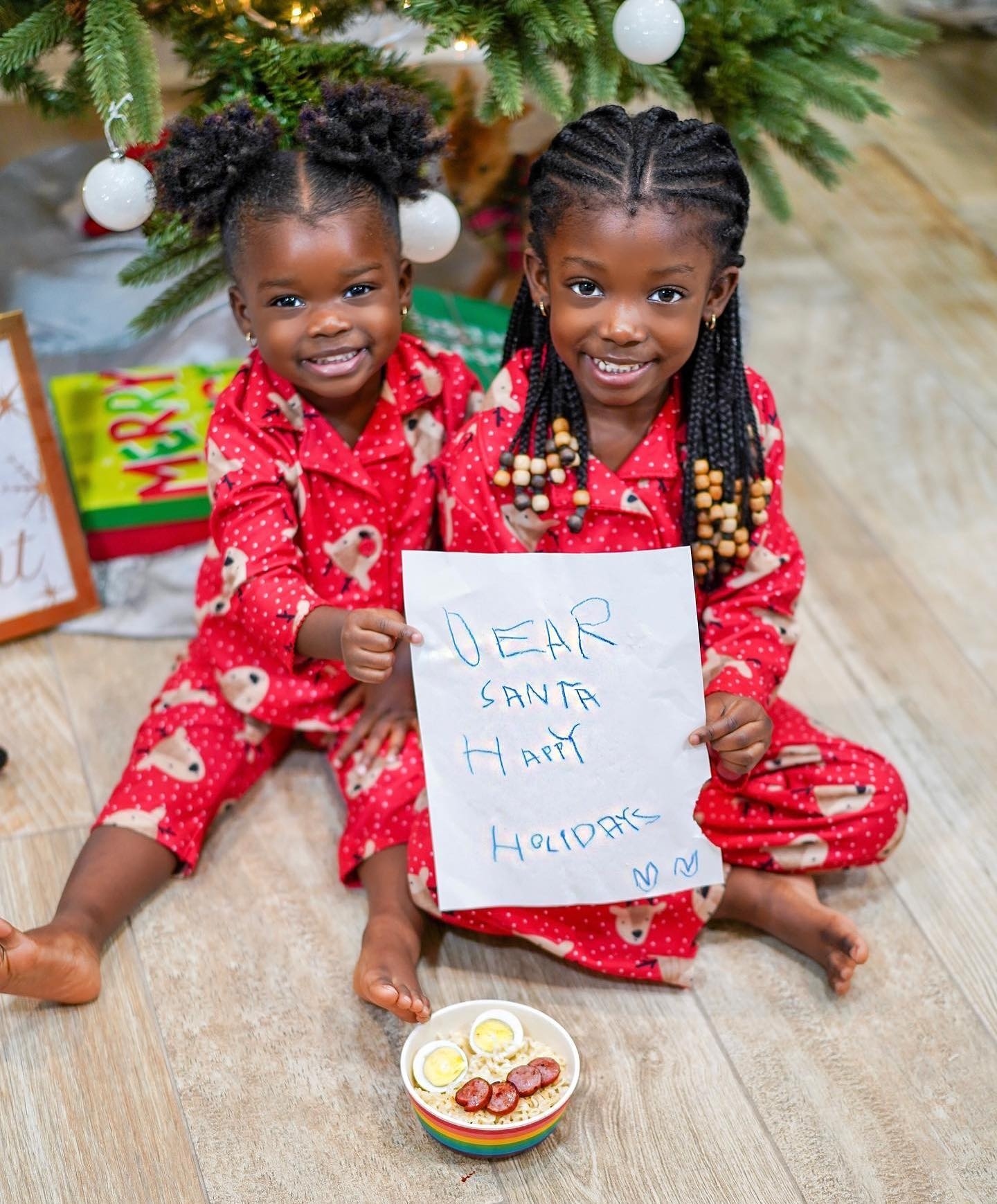 Leaving Santa ramen instead of cookies. 😀⁠
⁠
#repost @rie_defined ⁠
⁠
‘Twas Christmas 2021 & the girls were waiting on Santa to come get his bowl of @maruchan_inc noodles while they were hot & ready. ⁠
⁠
Hopefully he arrives on Thanksgiving this year cuz their patience grow shorter & shorter as the years progress…⁠
⁠
Do y’all think Santa will be good to both Layla & Linah??? 🤔 ⁠
⁠
#LivingLahai #FroBabies #NaturalHair #NaturalHairStyles #NaturalHairDaily #BlackMomsBlog #BlackMothers #BlackMotherhood #MunaMommy #BlackGirlMagic #Viral_QT #NaturalHairKids #DarkSkinGirls #ShareTheEveryMom #BlackLove #BlackJoy #BlackFamiliesMatter ⁣ #thecrownact #BlackFamilyGoals #TheFamilyDiary ⁣#BlackFamilies #TheWorldsFavoriteBaby #TeamMotherly #munamommy