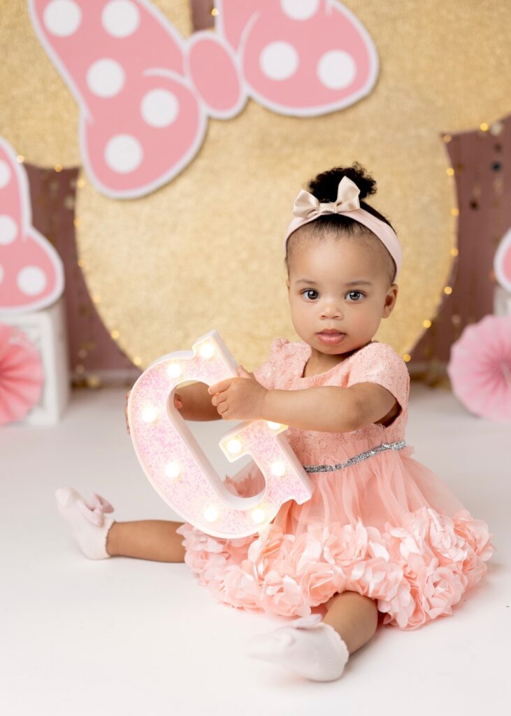 Gabrielle Gambrell reflects on motherhood and celebrates her daughter Gigi's first birthday with a pretty-in-pink photo shoot!