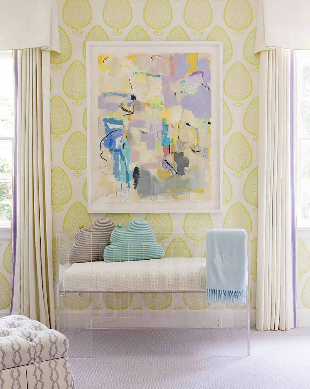 Collins Interiors - A gender nursery room with yellow, blue, and purple